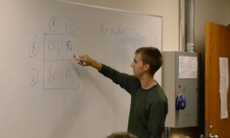 Student at whiteboard