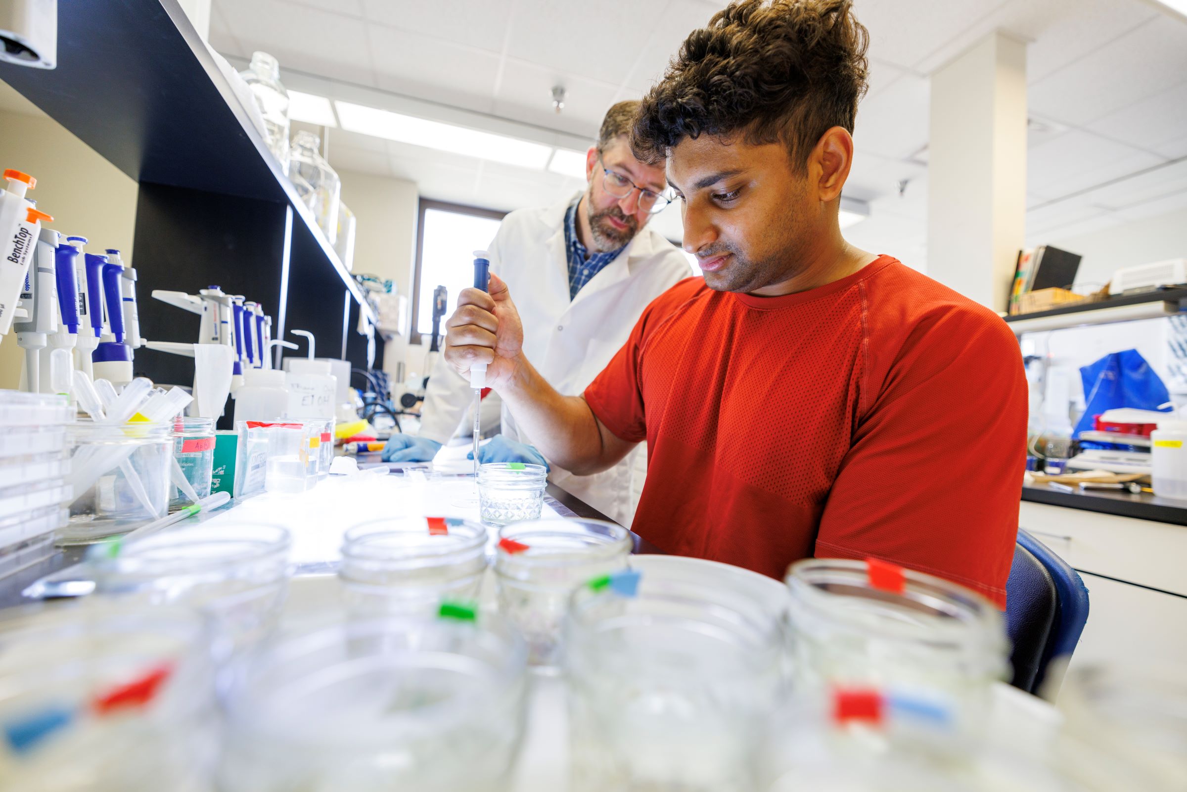 Faculty member and student in lab