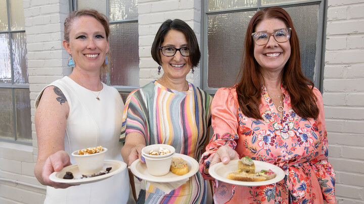 CAREMI leaders Nicole Sexton, Eileen Hebets and Angie Pannier served appetizers featuring edible insects during the Bugeater canapé party during the Aug. 19 Arthropodium symposium. The event showcased arthropods' impact on research, education, art and culture. 